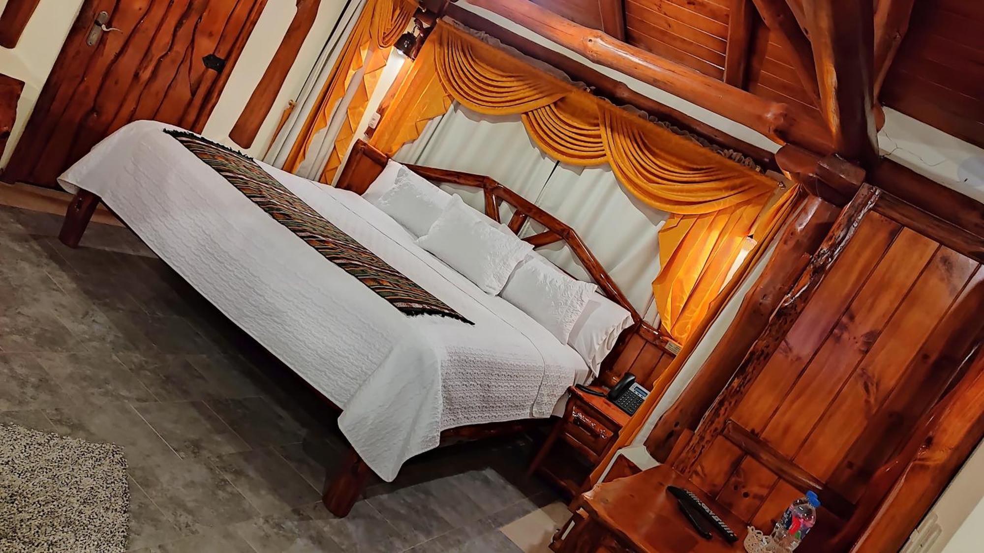 Hostal Huasicama Latacunga Habitación foto